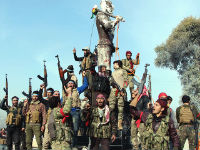 875749_sirijci-afrin-kurd-spomenik-beetajpg